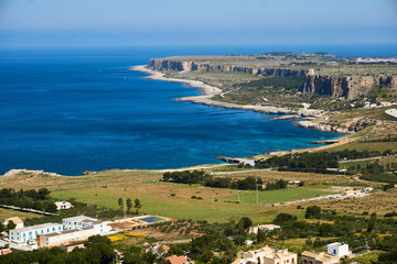 picturesque coast of San Vito lo Capo in Sicily on a beautiful sunny day as seen from a climbing crag