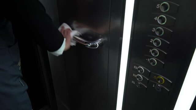 Disinfection of elevator push button with sanitizer spray
