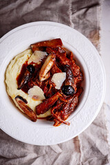 Brisket ragu with mushrooms and parmesan mash.style rustic.