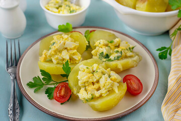 Boiled and fried potatoes stuffed with egg filling