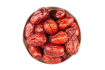 red dried chinese date in bowl on white background