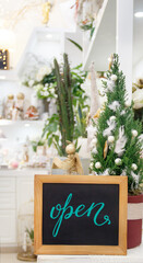 Flower shop with chalkboard with 'open' lettering