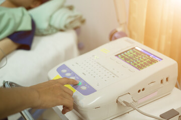  Electrocardiogram in the hospital, analyzing ECG electrocardiogram of patient in hospital.
