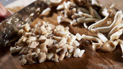 Cook chopped mushrooms on the board