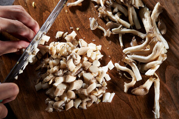 Cook chopped mushrooms on the board