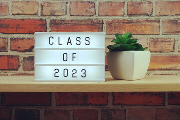 Class of 2023 alphabet letter on wooden background