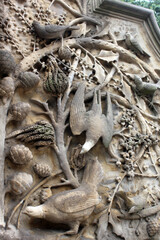 06.14.2013 New York, USA. Artistic composition in Central Park. Bas-relief depicting birds and plants. 