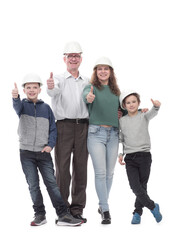 in full growth. happy family in protective helmets.