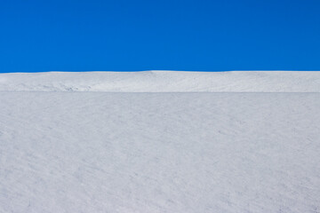 Fototapeta na wymiar snow cover and winter sky