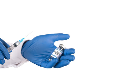 . The doctor draws the coronavirus vaccine from a glass vial with a syringe. isolated. copy space