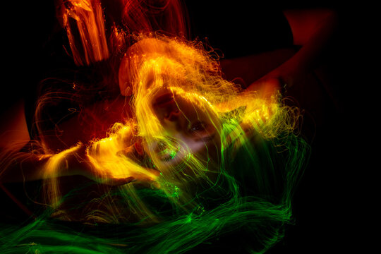 lightpainting portrait, new art direction, long exposure photo without photoshop, light drawing at long exposure. abstract portrait 	
