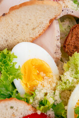 Caesar salad on a white plate close-up. 
