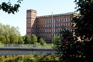 Old Industrial Mill Building with Foreground Bridge 