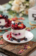 Mini fruit cake on a blue wooden background