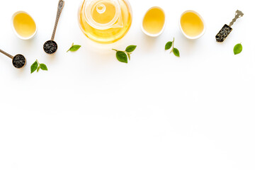 Asian tea ceremony with cups and teapot, top view