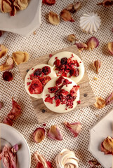 White handmade chocolates on a white background