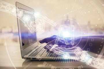 Double exposure of woman hands working on computer and data theme hologram drawing. Tech concept.