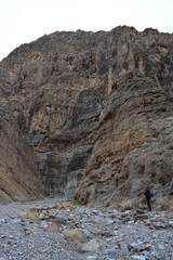 Fototapeta na wymiar one person hiking in the titus canyon in the Death Valley National Park on a December day