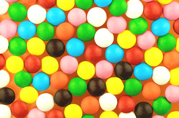 Rainbow bright candies. Cheerful colorful childrens yummy background