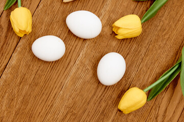 Fototapeta na wymiar spring flowers white eggs easter holiday decoration