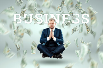 A man in a business suit levitates in the lotus position against the background of falling dollars, rain of money. Business concept, bookmaker, sports betting, investment, passive income.