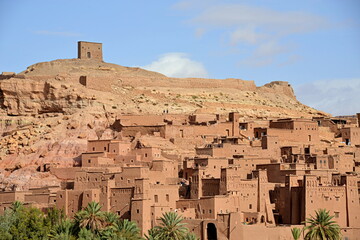Fototapeta na wymiar MOROCCO - AIT BEN HADDOU, Fortified village, ancient architecture of southern Morocco, made up of a group of buildings built in 1600 with organic materials, including a rich red mud.