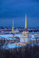 Saint-Petersburg, Russia - 9 february 2021: Winter panorama of Admiralty and Peter and Paul cathedral from the colonnade