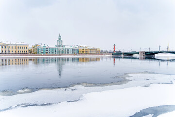 Panorama of the city, frozen Neva and view of the Kunstkamera in St. Petersburg, winter landscape