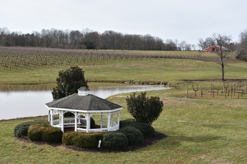 Beautiful view of a white wood gazebo at a winery - great place for a proposal