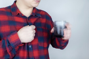 A patient with Parkinson's disease has trembling hands. Tremor of the extremities in various...