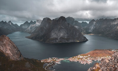 City of Reine  from the top of the Reinebringen mountain in sunny autumn day. Lofoten Islands, Norway,