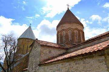 Fototapeta na wymiar GEORGIA ANANURI Ananuri is an architectural complex, consisting of a castle with crenellated walls,and two churches: the old church of the Virgin and the church of the Dormition