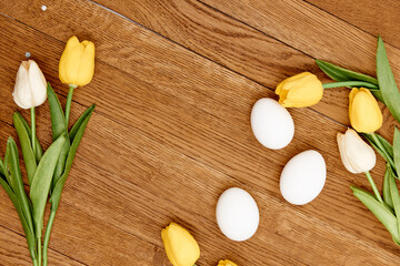 tulip easter eggs wooden background top Copy Space