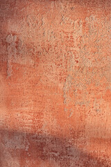 Sample of colored microcement. Sample of orange plaster. Close-up. materials for repair