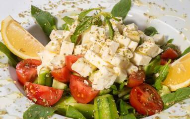 Green diet salad with cheese. Food photo.