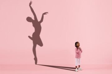 Childhood and dream about big and famous future. Conceptual image with girl and drawned shadow of...