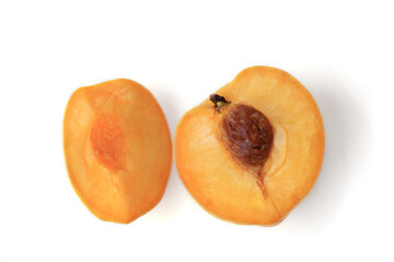 Ripe yellow peaches, delicious fruits of summer, isolated on white background.