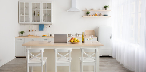 Fototapeta na wymiar Minimalist dining room interior and stylish kitchen, rent, ad and sale of flat