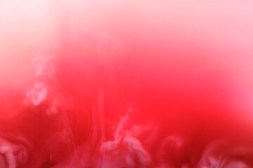 Fluid art. Red abstract background.