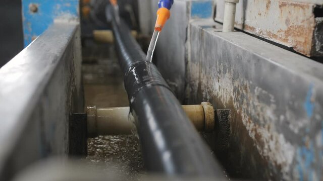 Production of multi-layer armored power cable at the factory. Cooling of the cable insulation.