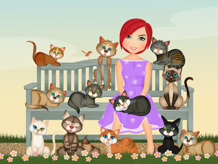 girl takes care of the feline colony