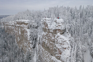 Aerial view of the majestic cliff above the forest.