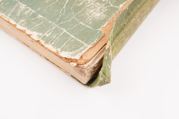 old green book on white background