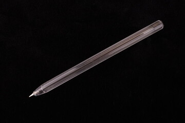 ballpoint pen on black background