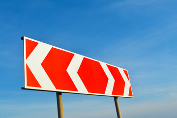Road sign, directional indicator. Vertical road marking.