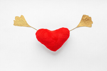 red soft heart on red background