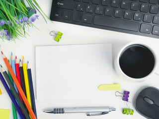 flat lay office workspace desk with coffee,blank notebook, electronic devices and computer. organizer mockup concept for blog or header image with space for text or copy space