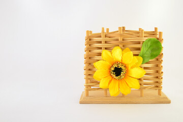 Decorative stand with a sunflower for napkins.