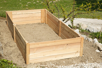 New wooden frame for a raised garden bed.