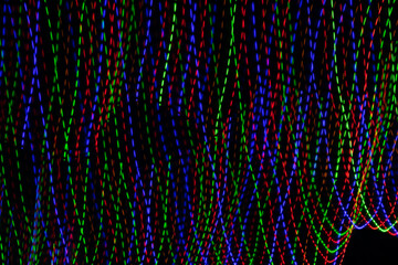 colored lines on a black background. textura